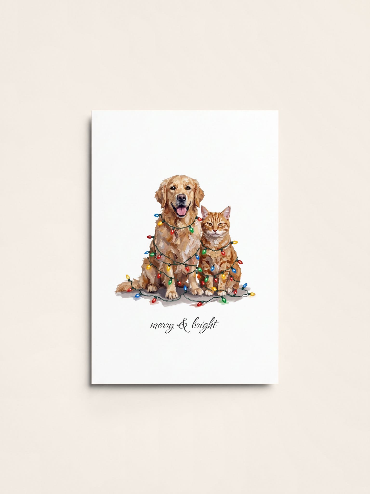 A Christmas card with a golden retriever and a ginger cat tangled in coloured Christmas lights